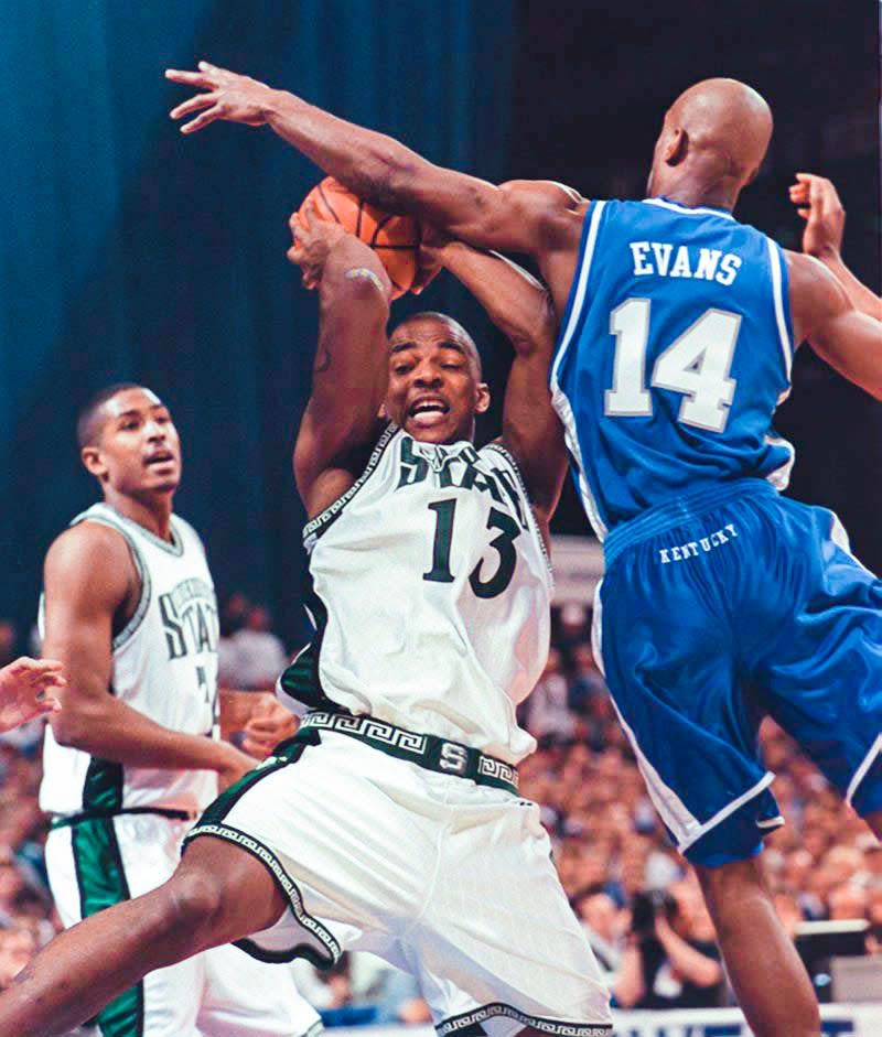 MSU's Antonio Smith, left, grabs a rebound away from Kentucky's Heshimu Evans during a game in 1999.