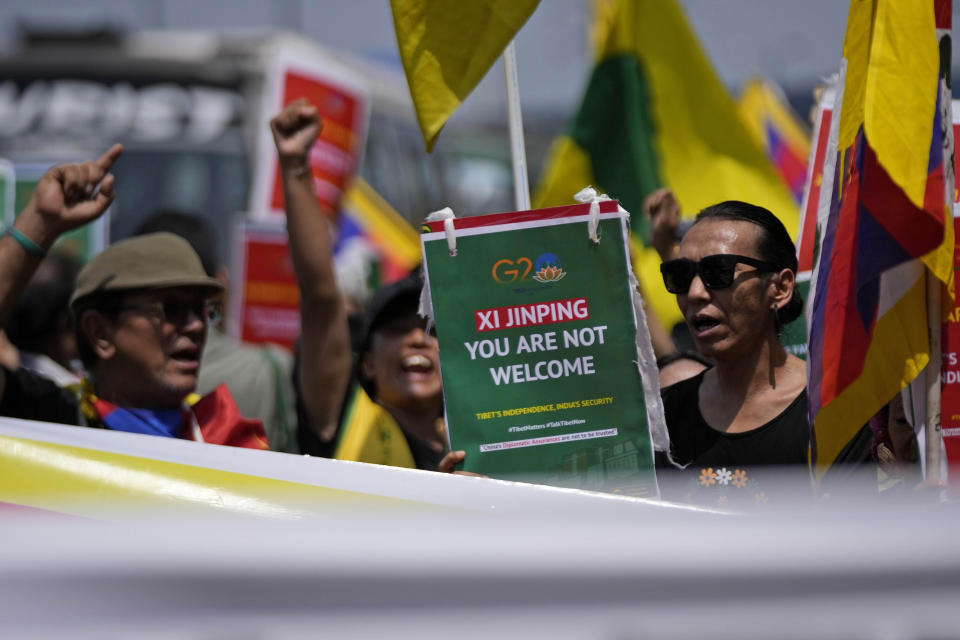 Tibetan youth activists shout slogans against the visit of the Chinese delegation to participate in the G20 Summit in New Delhi, India, Friday, Sept. 8, 2023. (AP Photo/Channi Anand)