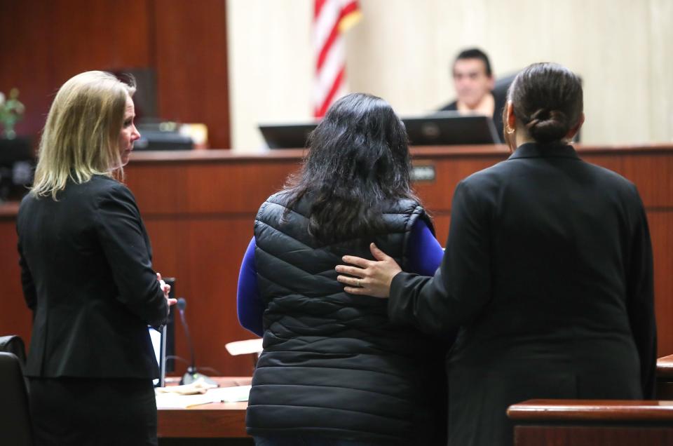 Maria Morales, center, speaks to the court during Jose Larin-Garcia's sentencing hearing Friday at the Larson Justice Center in Indio. Morales is the mother of Yuliana Garcia, one of four people Larin-Garcia is convicted of murdering.