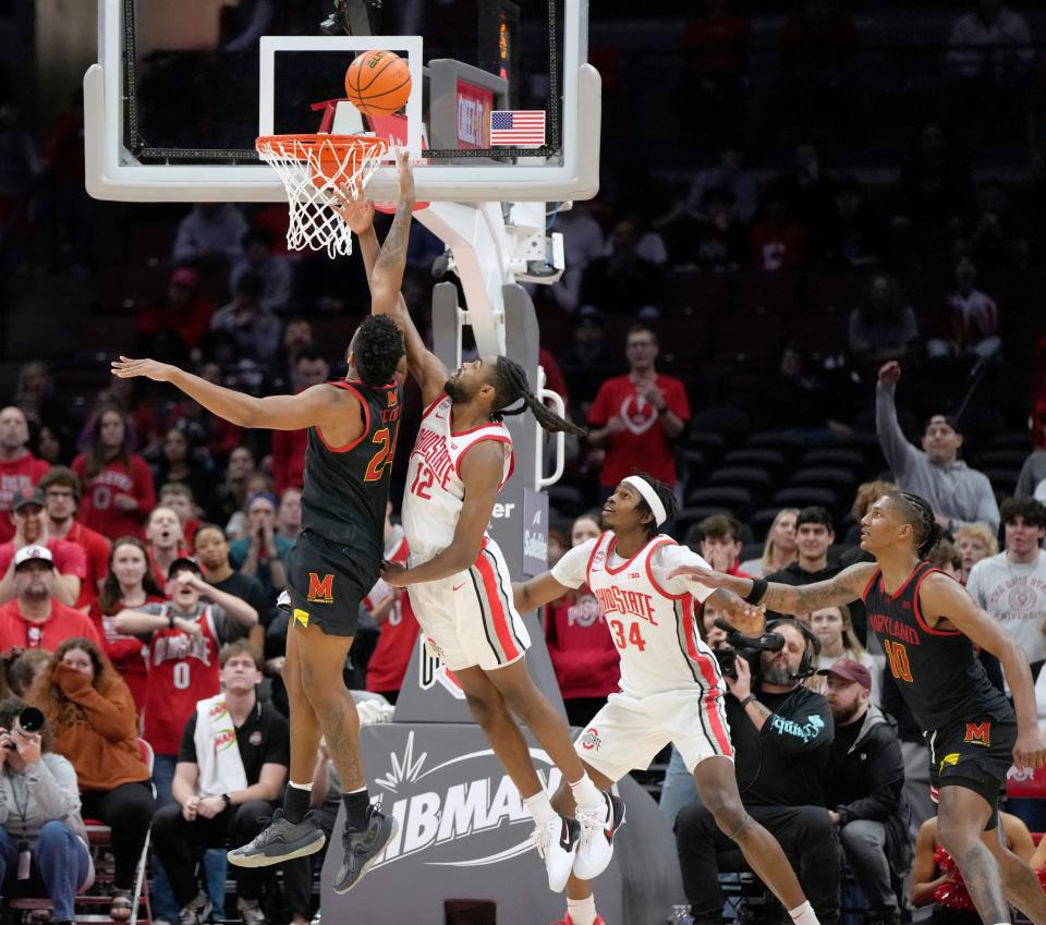 Feb. 10, 2024; Columbus, Ohio, USA; 
Maryland Terrapins forward Donta Scott (24) is guarded by Ohio State Buckeyes guard Evan Mahaffey (12) during the first overtime in a Division I NCAA basketball game at Value City Arena.