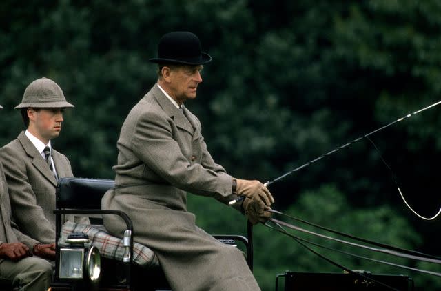 <p>Anwar Hussein/Getty</p> Prince Philip carriage driving in May 1988 at the Windsor Horse Show