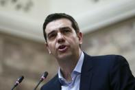 Greek Prime Minister Alexis Tsipras addresses members of his leftist Syriza party in the parliament February 17, 2015. REUTERS/Alkis Konstantinidis