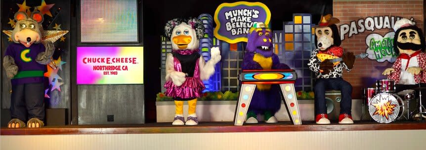 Chuck E. Cheese and Munch's Make Believe Band onstage at the Northridge, California location.