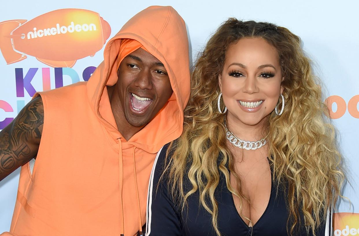 Nick Cannon, left, and Mariah Carey arrive at the Kids' Choice Awards at the Galen Center on Saturday, March 11, 2017, in Los Angeles.