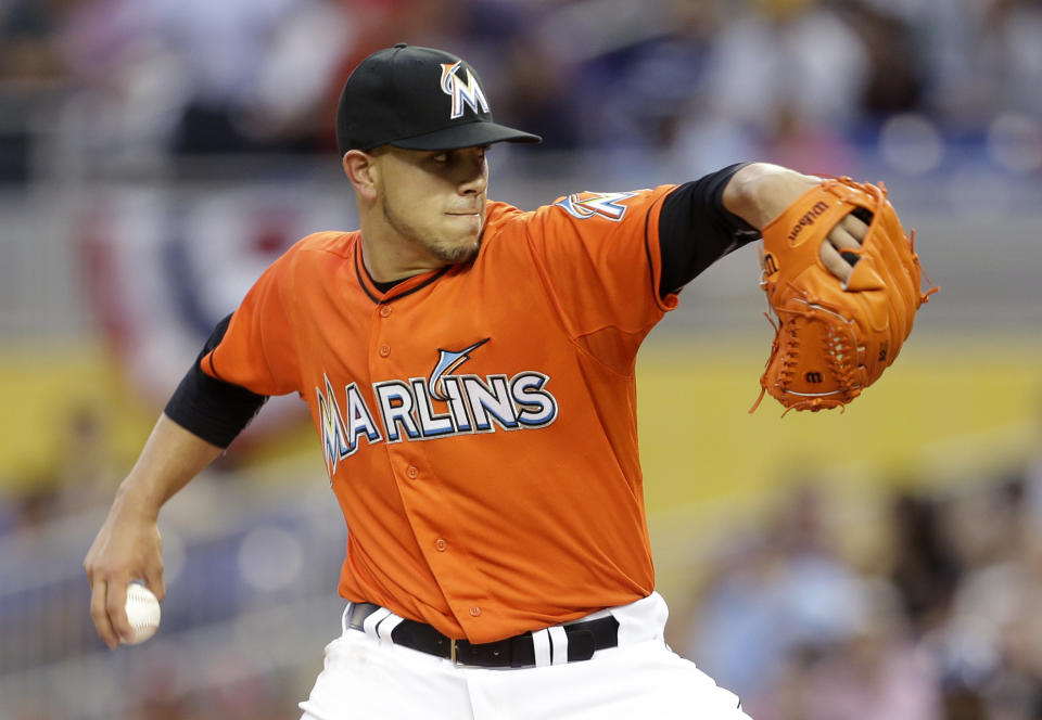 Miami Marlins starting pitcher Jose Fernandez throws during the first inning of an opening day baseball game against the Colorado Rockies, Monday, March 31, 2014, in Miami. (AP Photo/Lynne Sladky)