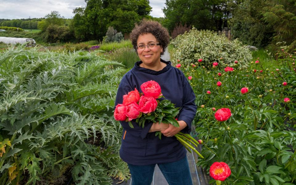 Cel Robertson in her flower garden - Andrew Crowley