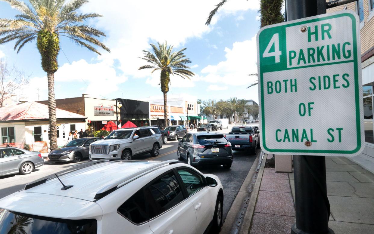 A New Smyrna Beach driver backs into a parking space on Canal Street, Friday, Feb. 10, 2023.