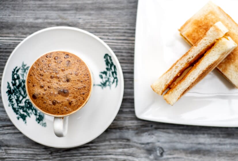 ALHAMBRA, CA - MARCH 31: Kaya & butter toast with a cup of white coffee from Ipoh Kopitiam on Thursday, March 31, 2022 in Alhambra, CA.(Mariah Tauger / Los Angeles Times)