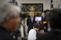 Malaysia parliament lower house speaker Mohamad Ariff Md Yusof, speaks to media after a lower house vote on motions to appoint a new speaker during a parliament session in Kuala Lumpur, Malaysia, Monday, July 13, 2020. Malaysian new Prime Minister Muhyiddin Yassin narrowly won a motion to boot the parliament speaker Monday, scraping through the first test of his support nearly five months after he took power. (AP Photo/Vincent Thian)