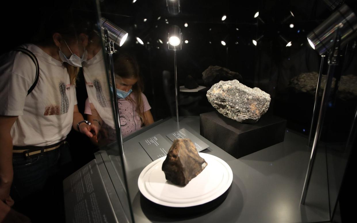 The Murchison meteorite is seen in a display case - Ali Haider/EPA-EFE/Shutterstock