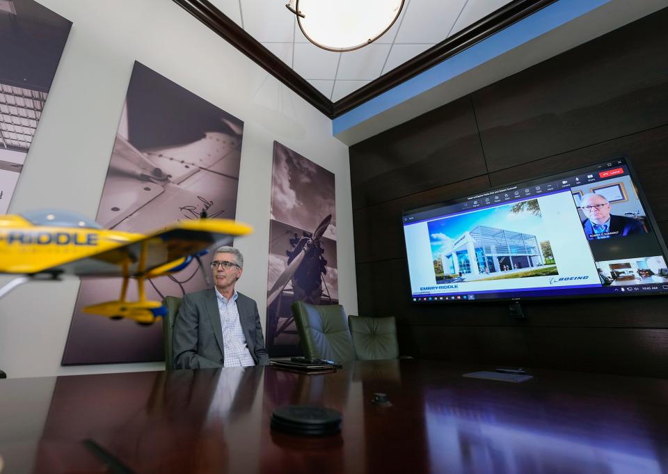 Dr. P. Barry Butler, left, president of Embry-Riddle Aeronautical University, and former NTSB Chair Robert Sumwalt (on the video screen) talk about plans to build a home for the new Boeing Aviation & Aerospace Safety Center at Embry-Riddle on the university's Daytona Beach campus on Friday, April 7, 2023. The facility is expected to open in January 2024. Sumwalt is the center's executive director.