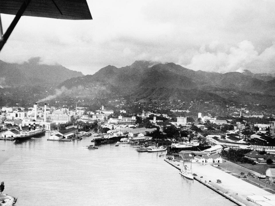The harbor at Honolulu, Hawaii is pictured July 7, 1934, President Roosevelt's ship the cruiser Houston is expected to tie up at pier two, foreground, when the President arrives for his first visit to the Islands in late July