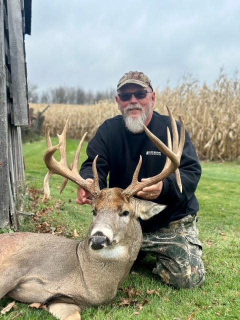 Dave Paplham shows the buck known as the ‘Mishicot Monster’ he arrowed Nov. 3, 2023, on his own property. Many people were hunting this buck until he made his fatal mistake during the archery season.