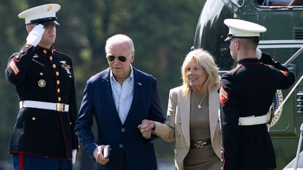 PHOTO: President Joe Biden and First Lady Jill Biden disembark from Marine One upon arrival at Fort McNair in Washington, D.C., July 4, 2023. (Saul Loeb/AFP via Getty Images)