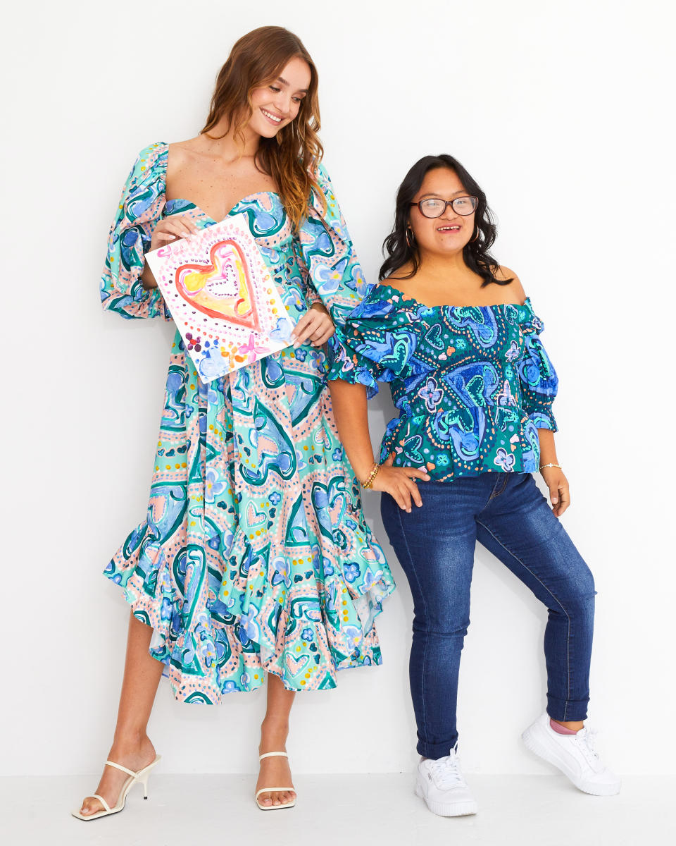 Stephanie Portoviejo and a model wear Alivia dresses inspired by her artwork.