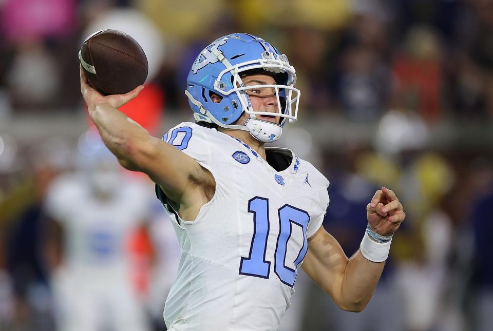 ATLANTA, GEORGIA - OCTOBER 28:  Drake Maye #10 of the North Carolina Tar Heels looks to pass against the Georgia Tech Yellow Jackets during the second quarter at Bobby Dodd Stadium on October 28, 2023 in Atlanta, Georgia. (Photo by Kevin C. Cox/Getty Images)