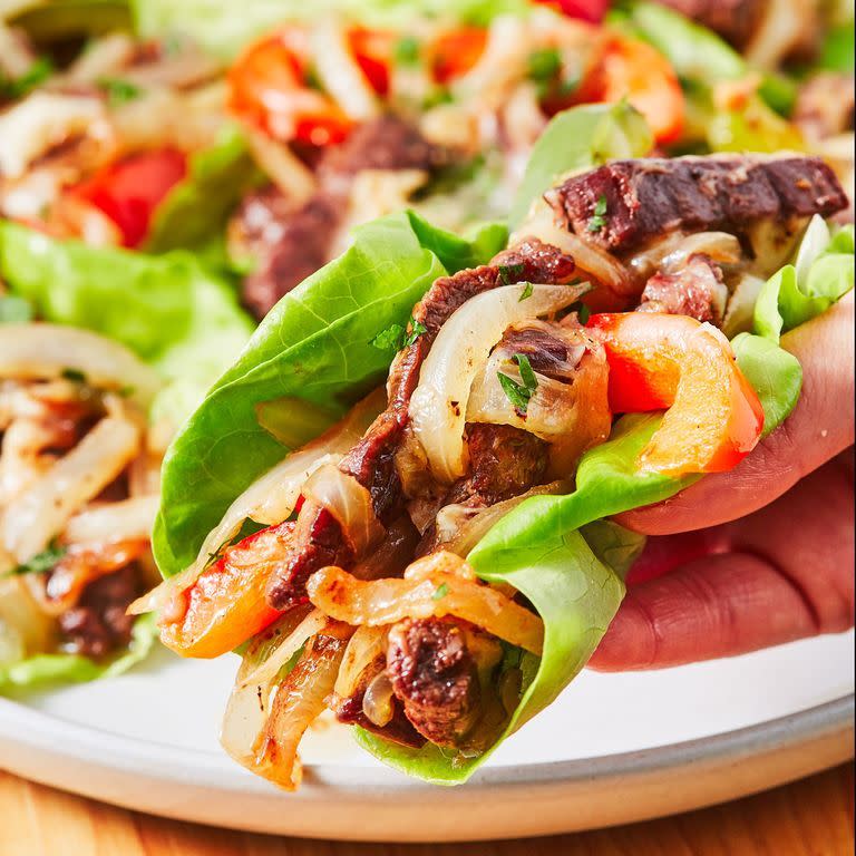 <p>You will love these low carb Philly Cheesesteak Lettuce Wraps. And before you get all riled up, no, they're not in any way authentic. We'll be the first to admit it! </p><p>Get the <a href="https://www.delish.com/uk/cooking/recipes/a32090138/no-carb-philly-cheesesteaks/" rel="nofollow noopener" target="_blank" data-ylk="slk:Philly Cheesesteak Lettuce Wraps" class="link ">Philly Cheesesteak Lettuce Wraps</a> recipe.</p>