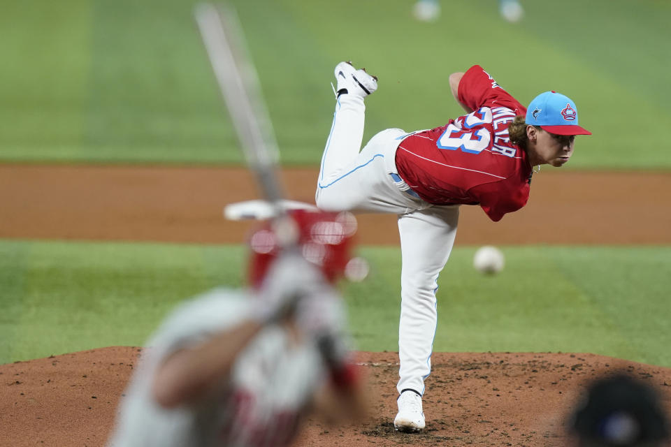 Miami Marlins starting pitcher Max Meyer throws to Philadelphia Phillies' J.T. Realmuto during the second inning of a baseball game, Saturday, July 16, 2022, in Miami. (AP Photo/Lynne Sladky)