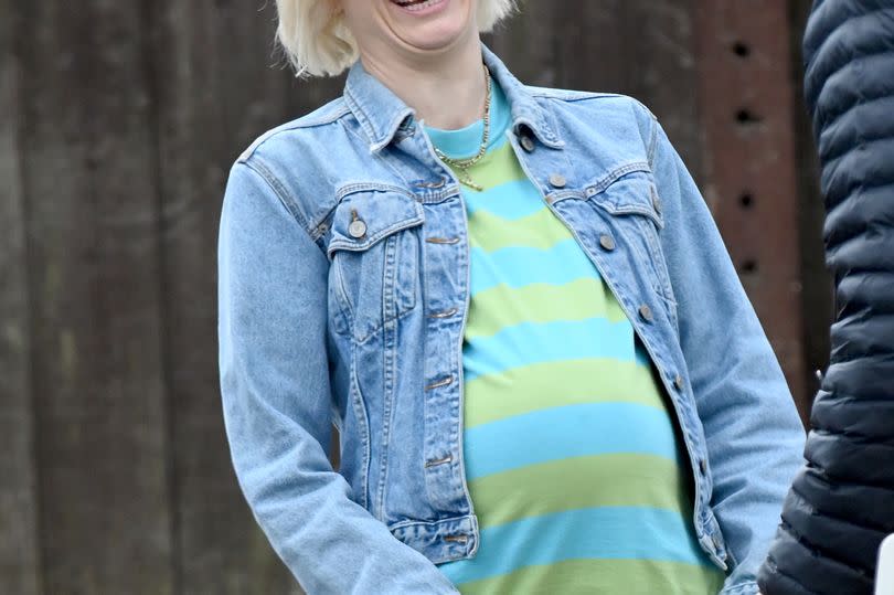 Jodie Whittaker looked happy as she filmed scenes in Sale, Trafford