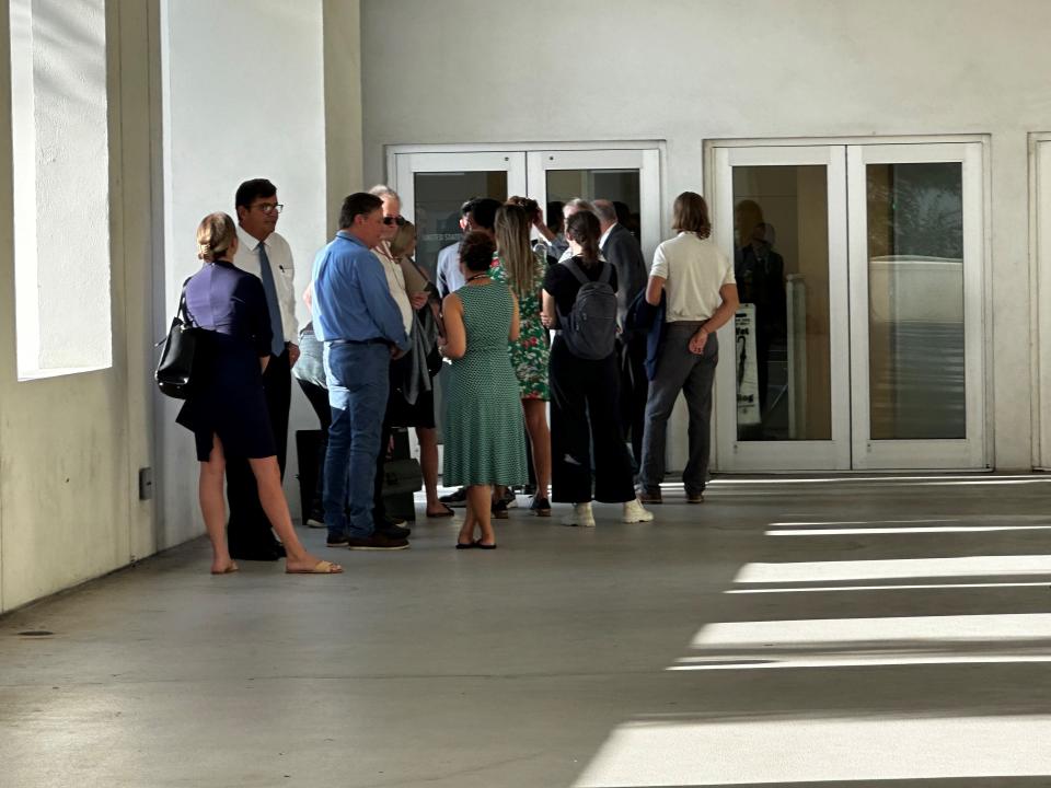 Media representatives line up at the Alto Lee Adams Sr. U.S. Courthouse Aug. 10, 2023, in advance of arraignment hearings in the Trump classified documents case.