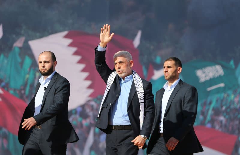 Palestinians attend rally to mark 35th anniversary of Hamas founding, in Gaza City