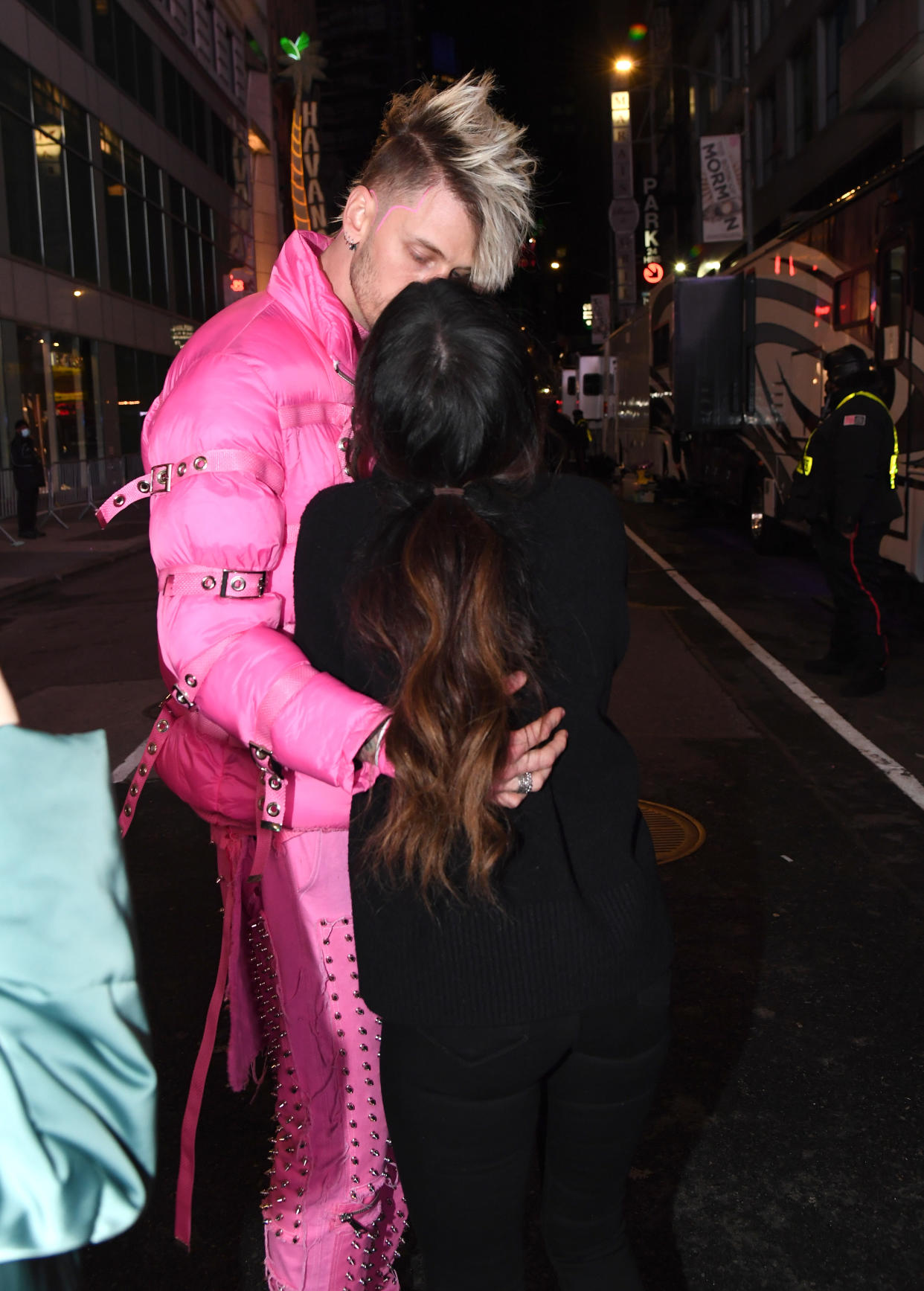 NEW YORK, NEW YORK - DECEMBER 31: Machine Gun Kelly and Megan Fox in Times Square during 2021 New Year’s Eve celebrations on December 31, 2020 in New York City. (Photo by Kevin Mazur/Getty Images)