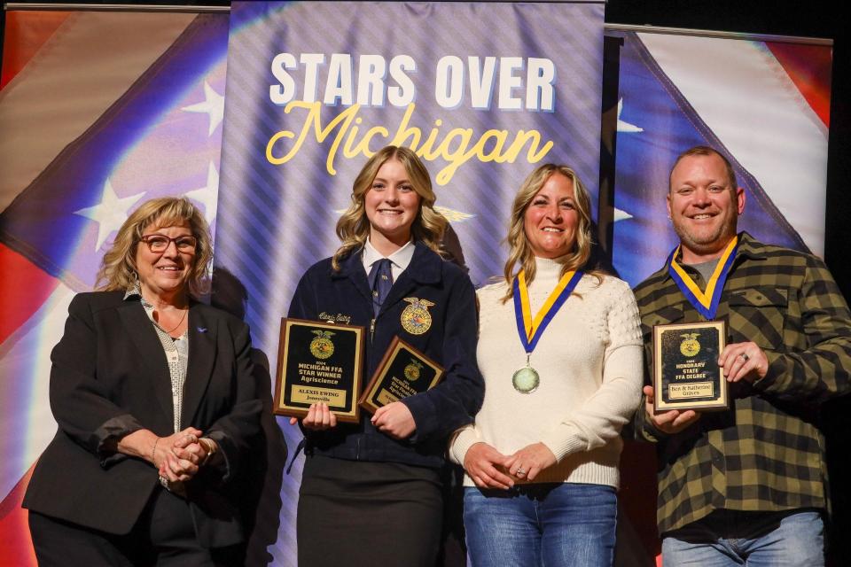 Jonesville student athlete senior Alexis Ewing, (middle), was one of the finalists for the MHSAA Scholar Athlete Awards. (Pictured here with a Michigan Corn representative and Katherine and Ben Graves after receiving the STAR award.