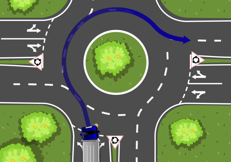 A truck is pictured at a two-lane roundabout.