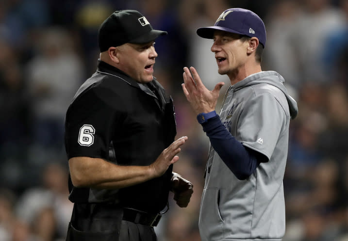 Manager Craig Counsell of the Milwaukee Brewers argues with home plate umpire Mark Carlson in the ninth inning against the Colorado Rockies at Coors Field on Sept. 28, 2019 in Denver. Photo by Matthew Stockman/Getty Images