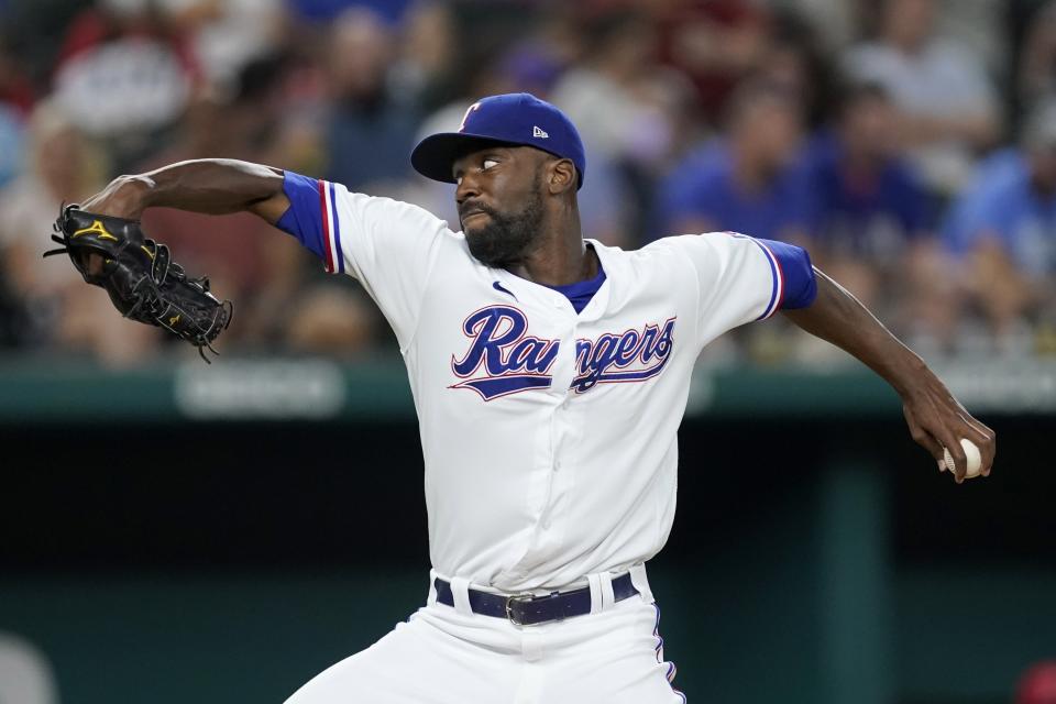 Texas Rangers starting pitcher Taylor Hearn throws in the second inning of a baseball game against the Los Angeles Angels in Arlington, Texas, Wednesday, Sept. 29, 2021. (AP Photo/Tony Gutierrez)