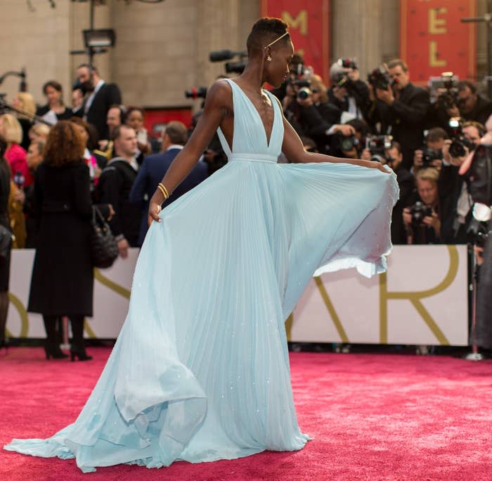 Nyong'o in her Oscars dress on the red carpet