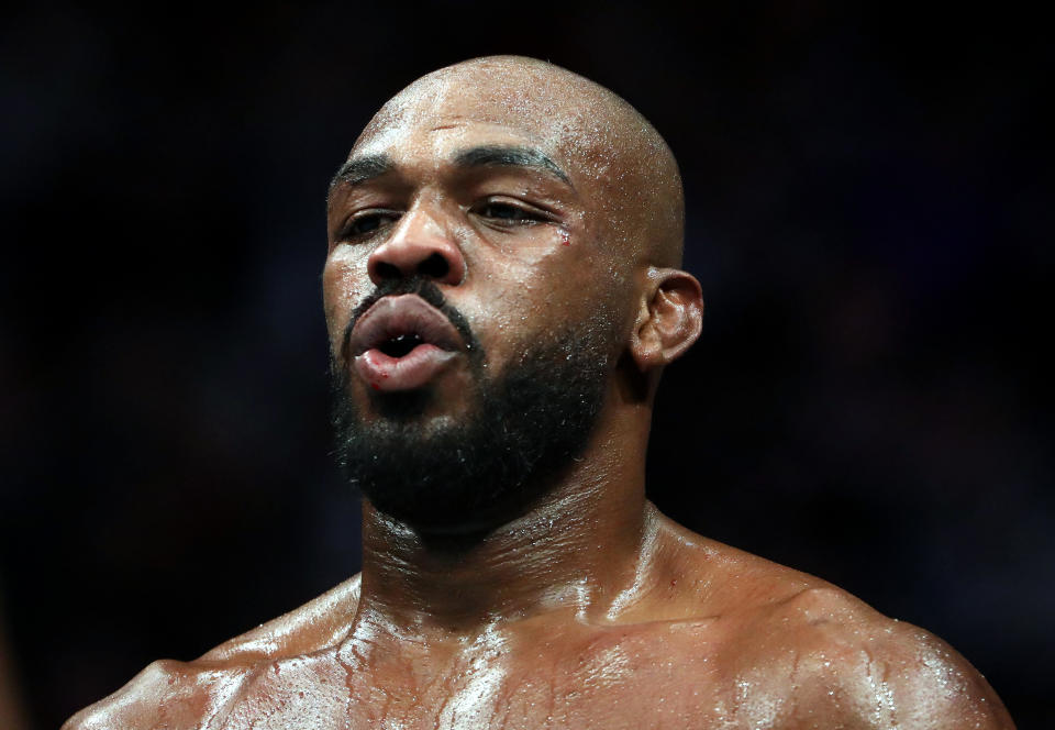 HOUSTON, TEXAS - FEBRUARY 08:  Jon Jones in his fight against Dominick Reyes in their UFC Light Heavyweight Championship bout during UFC 247 at Toyota Center on February 08, 2020 in Houston, Texas. (Photo by Ronald Martinez/Getty Images)