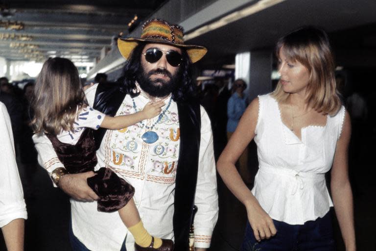 This photo taken in June 1973 shows Greek singer Demis Roussos with his wife Monique and their daughter Emily at Orly airport in Paris