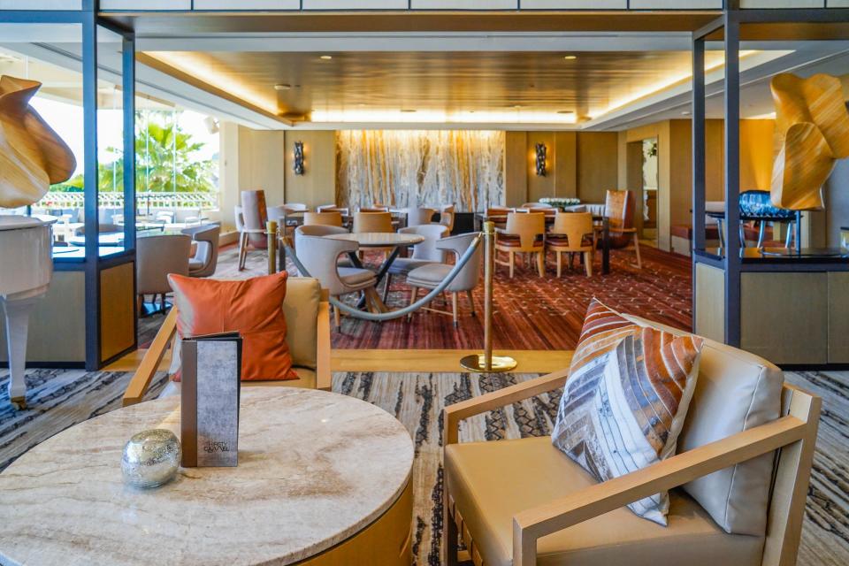A warm-toned sitting area in a modern hotel lobby