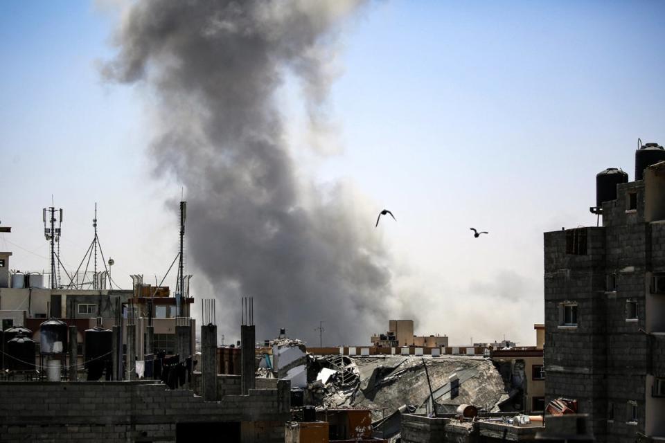 Smoke billows from Israeli strikes in Rafah in the southern Gaza Strip (AFP via Getty Images)