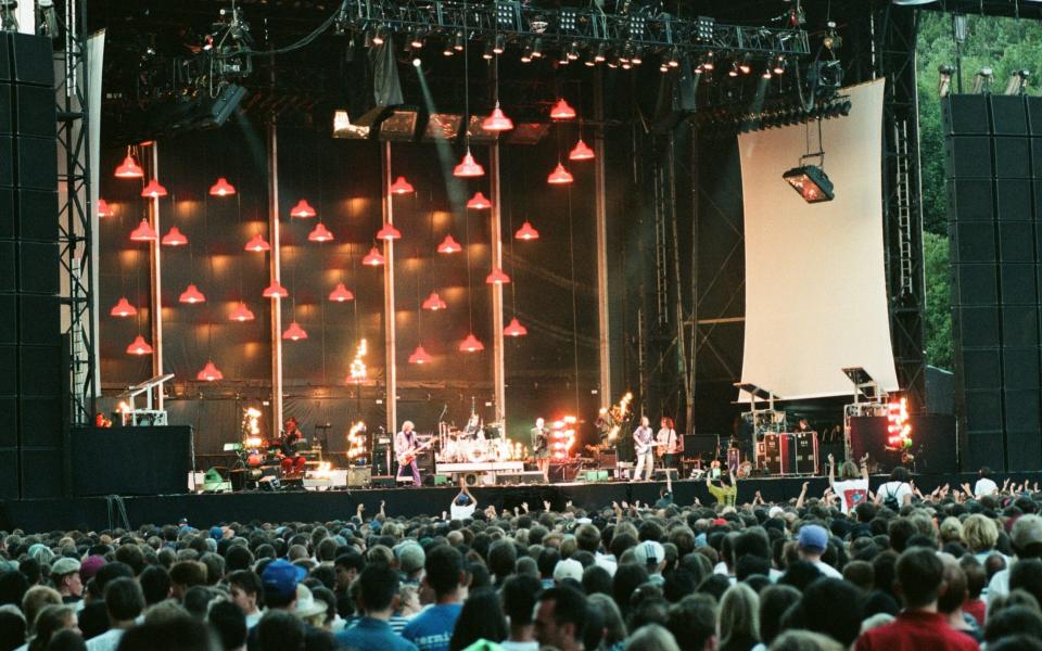 REM playing Galpharm Stadium, July 1995 - Getty