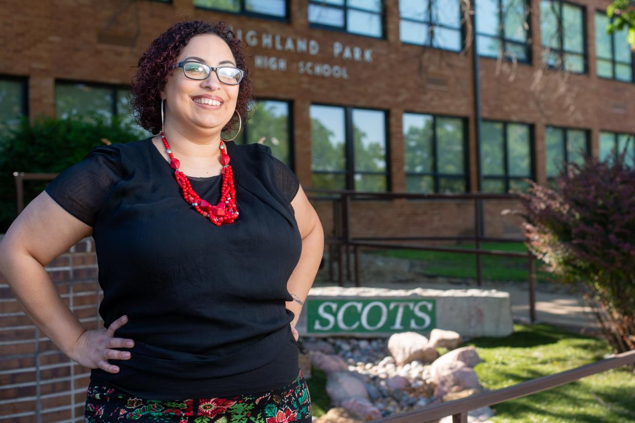 Highland Park high school's new principal, Juli Watson, stands outside of the schools entrance Thursday morning by a spot she says is her favorite. Watson, who first started as a classroom teacher here nine years ago, has naturally progressed to be in the position she is now.