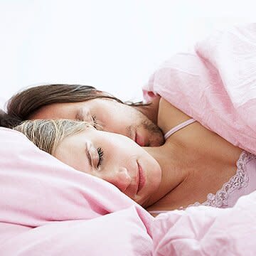 man and woman sleeping