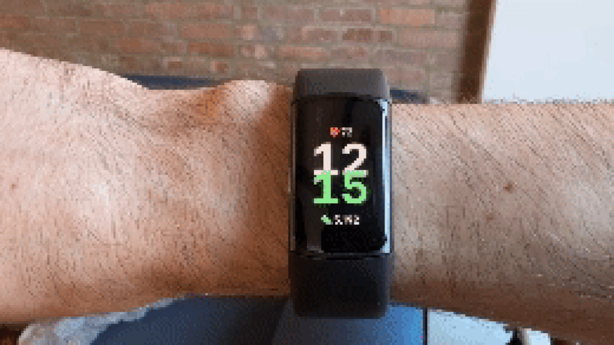 A close up video of a man swiping through the screen of the Fitbit Charge 6 to show different apps, including notifications, exercise, alarms, timers, EDA scan, ECG, Google Maps, and YouTube Music. (Courtesy Harry Rabinowitz)