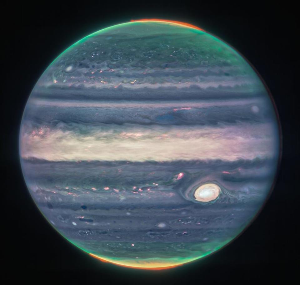 <div class="inline-image__title">Jupiter Showcases Auroras, Hazes (NIRCam Closeup)</div> <div class="inline-image__caption"><p>Jupiter's northern and southern poles reveal its auroras (red) and a planetary haze (green and yellow).</p></div> <div class="inline-image__credit">Credit: NASA, ESA, CSA, Jupiter ERS Team; image processing by Judy Schmid</div>