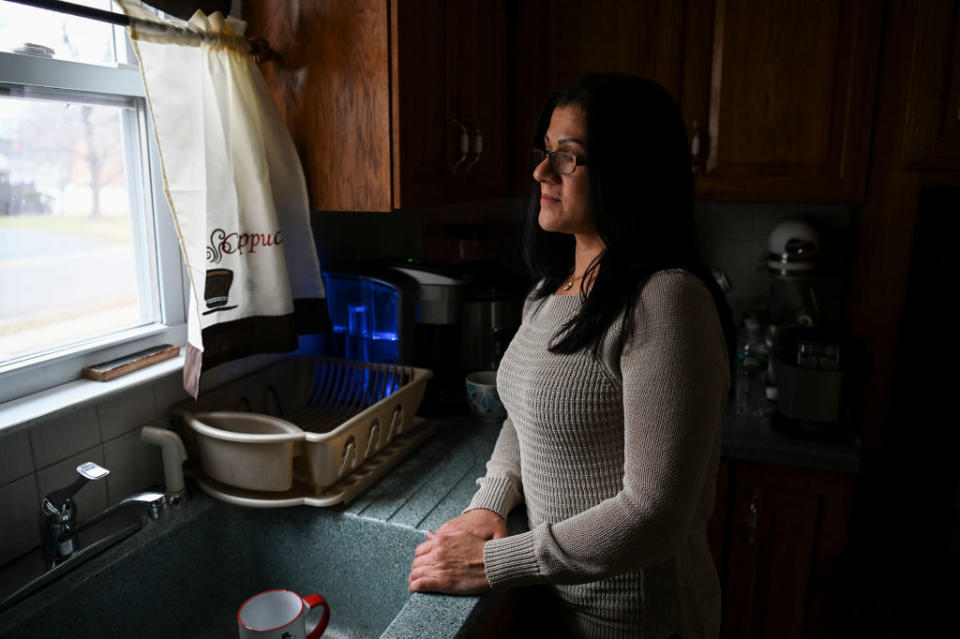 Sandra Diaz, who worked at the Trump National Golf Club Bedminster before getting her Green Card, poses for a portrait at home in Bound Brook, NJ on January 7, 2019.<span class="copyright">Photo by Carolyn Van Houten/The Washington Post via Getty Images</span>