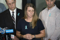 Nichole Schmidt, mother of Gabby Petito, whose death on a cross-country trip has sparked a manhunt for her boyfriend Brian Laundrie, pauses as she answer reporter's questions during a news conference, Tuesday, Sept. 28, 2021, in Bohemia, N.Y. (AP Photo/John Minchillo)