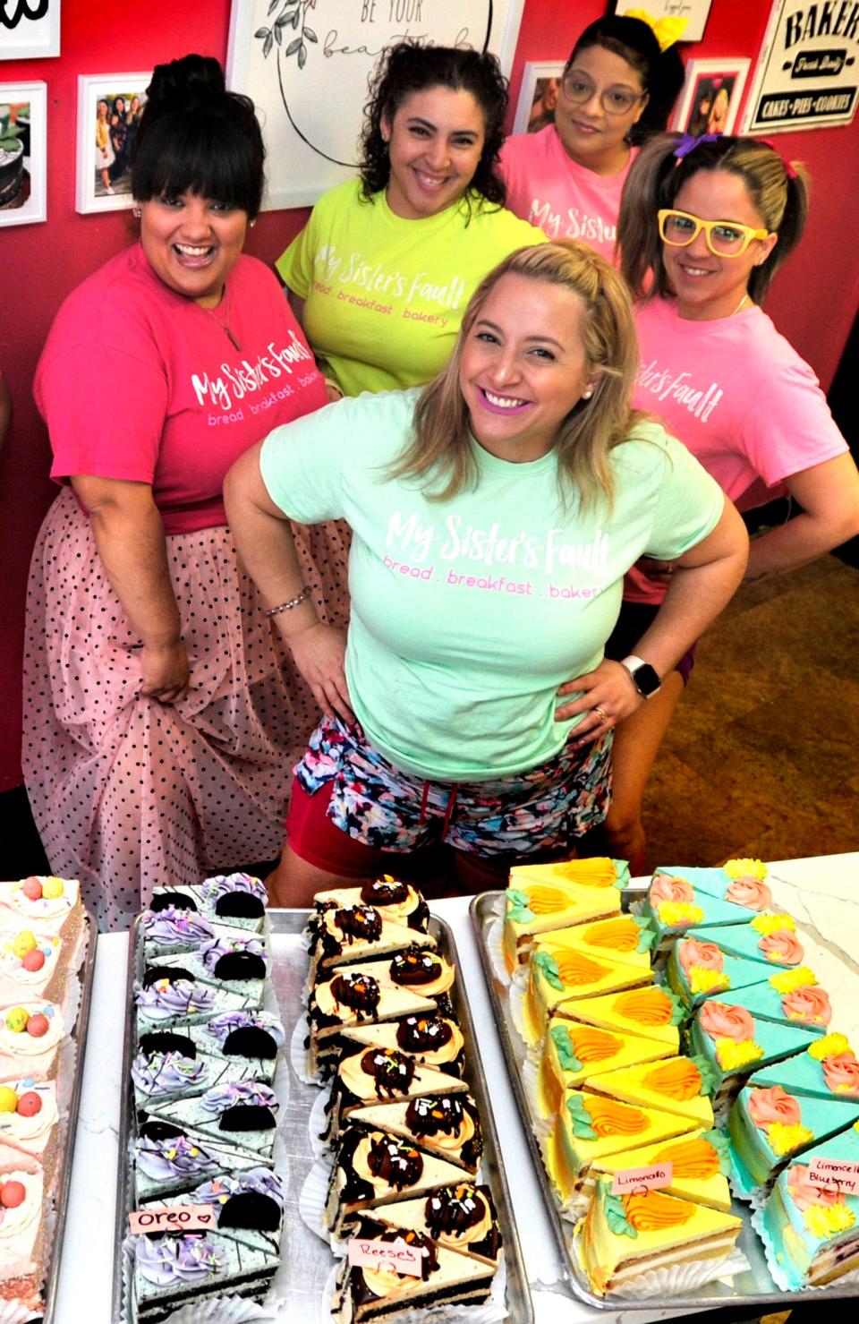 Sisters Rous Robles (front) and Angie Robles (left) opened a cafe/bakery in Milford with the help of other family members including (from left)  Lizbethmary Vargas, Maria Rosario and Jesmarie Santiago.