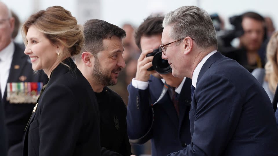 Labour leader Keir Starmer greets Ukraine's President Volodymyr Zelensky during the international ceremony. - Benoit Tessier/Reuters