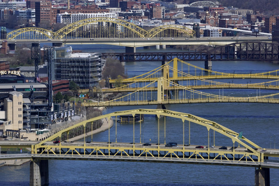 FILE - This April 2, 2021, file photo shows bridges spanning the Allegheny River in downtown Pittsburgh. Republicans in Congress are making the politically brazen bet that it’s more advantageous to oppose President Joe Biden’s ambitious rebuild America agenda than to lend support for the costly $2.3 trillion undertaking for roads, bridges and other infrastructure investments. (AP Photo/Gene J. Puskar, File)