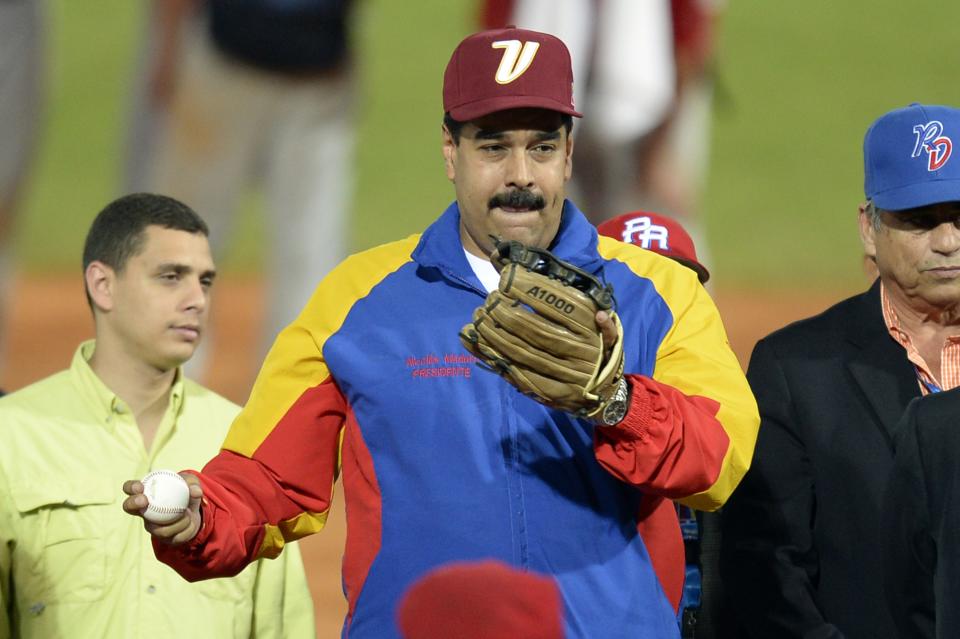 Venezuelan President Nicolas Maduro attends the opening ceremony of the 2014 Caribbean baseball series, on February 1, 2014, in Porlamar city, Nueva Esparta state, Margarita Island, Venezuela . AFP PHOTO/LEO RAMIREZ / AFP PHOTO / Leo RAMIREZ        (Photo credit should read LEO RAMIREZ/AFP via Getty Images)