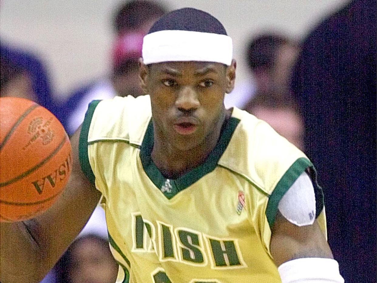 LeBron James during a St. Vincent-St. Mary High School basketball game in the early 2000s. (AP Photo, file)