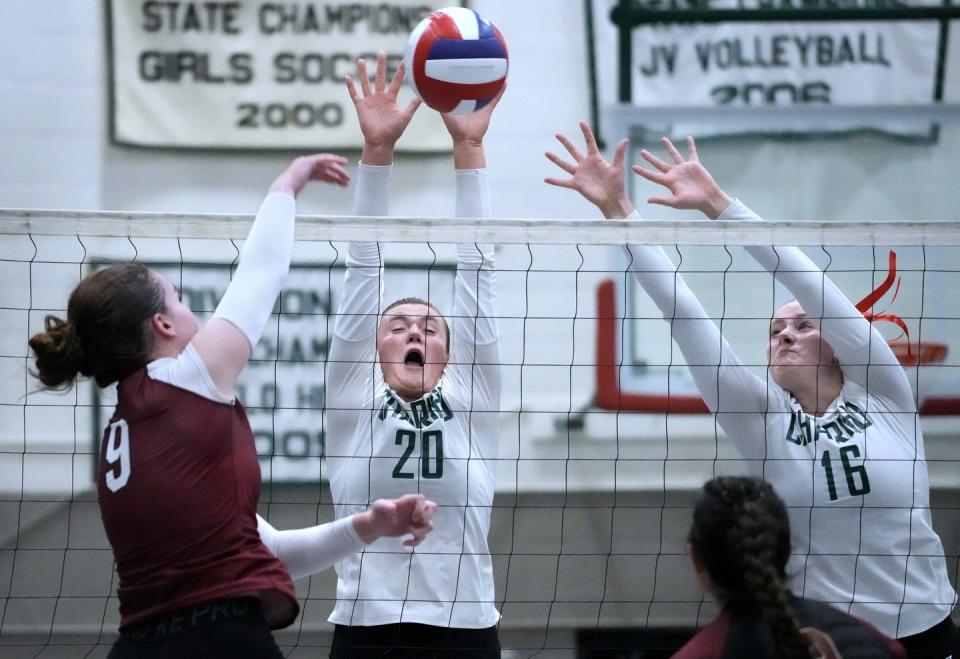 Chariho Chargers Jules White and Katja Nelson defend the net from a spike by La Salle Ram Kaelyn Whitaker during game three. Chariho won, 3-2.