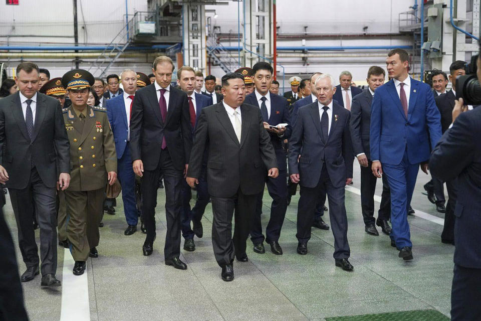 ADDS DATE - In this photo released by the governor of the Russian far eastern region of Khabarovsky Krai region Mikhail Degtyarev telegram channel, North Korean leader Kim Jong Un, center, visits Russian aircraft plant that builds fighter jets in Komsomolsk-on-Amur, about 6,200 kilometers (3,900 miles) east of Moscow, Russia Friday, Sept. 15, 2023. Mikhail Degtyarev, governor of the Russian far eastern region of Khabarovsky Krai region is on the right. (The governor of the Russian far eastern region of Khabarovsky Krai region Mikhail Degtyarev telegram channel via AP)