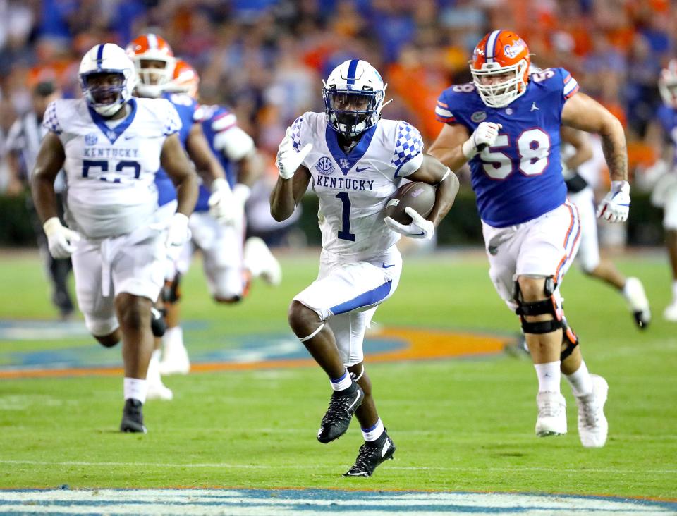 Kentucky Wildcats defensive back Keidron Smith (1) runs for a touchdown after making an interception during a game against the Florida Gators at Ben Hill Griffin Stadium at Steve Spurrier-Florida Field, in Gainesville FL, Sept. 10, 2022.